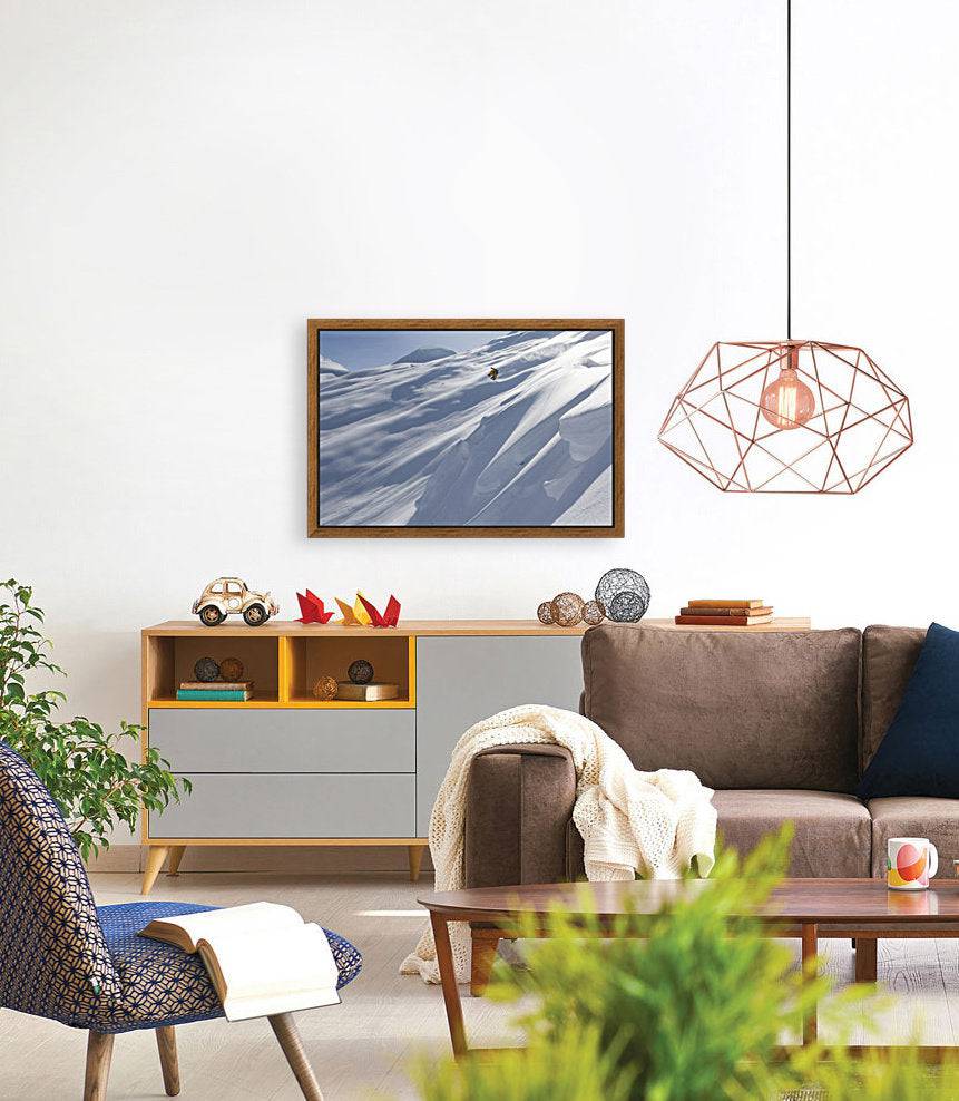 Professional snowboarder, Frederik Kalbermatten, heli boarding in the mountains above Haines - Powderaddicts