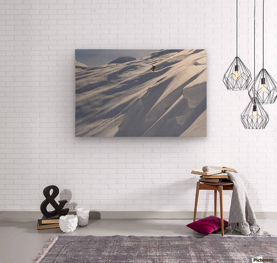 Professional snowboarder, Frederik Kalbermatten, heli boarding in the mountains above Haines - Powderaddicts