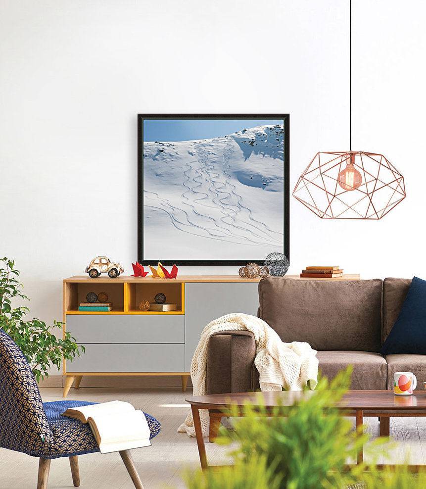 Ski tracks in the snow on a mountain - Powderaddicts