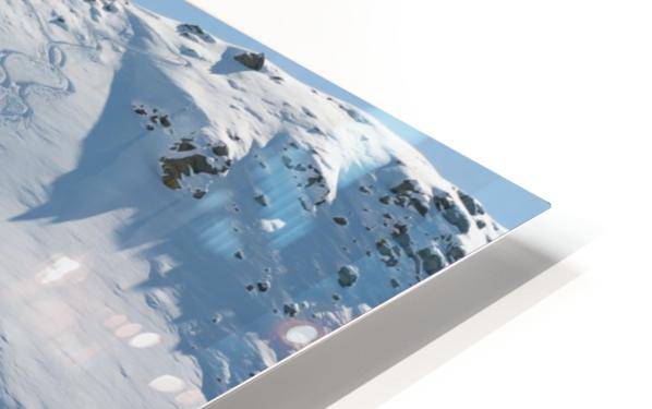 Ski tracks in the snow on a mountain - Powderaddicts