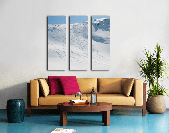 Ski tracks in the snow on a mountain - Powderaddicts