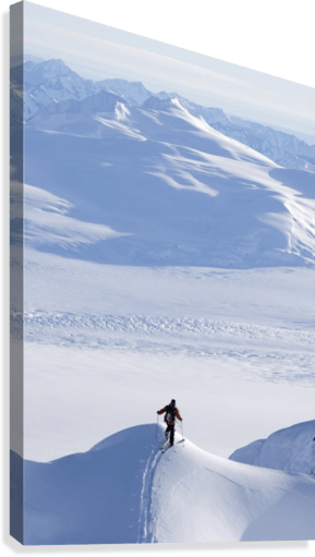 Skier Climbing Up Ridge - Powderaddicts