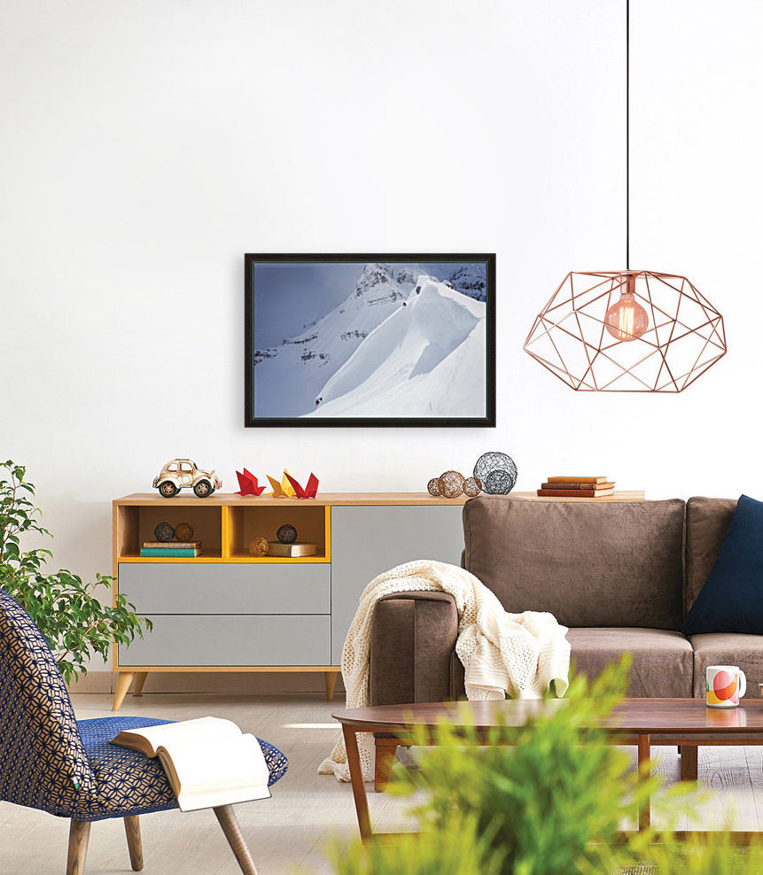 Skier On Crest Of Big Drop, Dwarfed By Mountain; Canada, British Columbia, Icefall Lodge - Powderaddicts