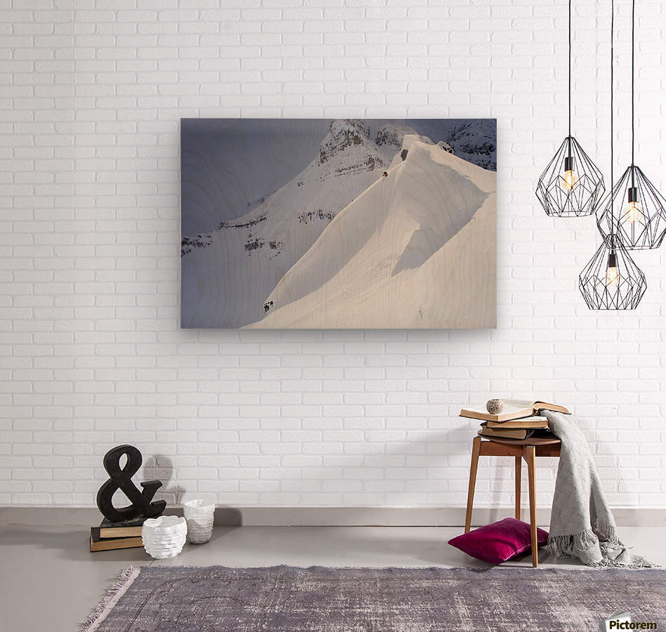 Skier On Crest Of Big Drop, Dwarfed By Mountain; Canada, British Columbia, Icefall Lodge - Powderaddicts