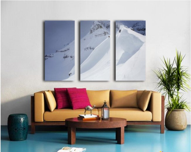 Skier On Crest Of Big Drop, Dwarfed By Mountain; Canada, British Columbia, Icefall Lodge - Powderaddicts