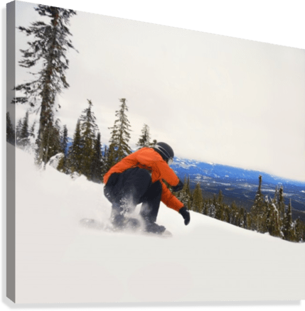 Snowboarder Crouching Down Low - Powderaddicts