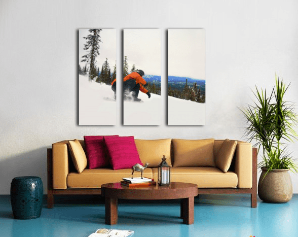 Snowboarder Crouching Down Low - Powderaddicts