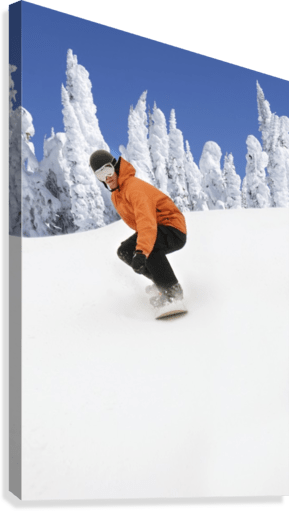 Snowboarder Going Down Snowy Hill - Powderaddicts