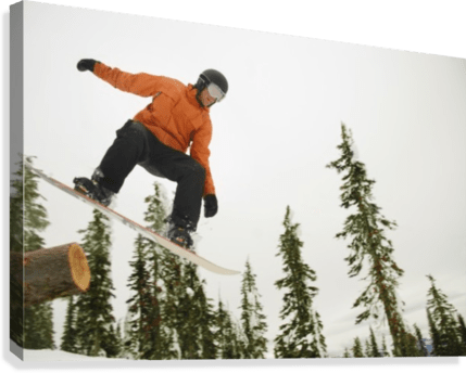 Snowboarder In Mid Air - Powderaddicts