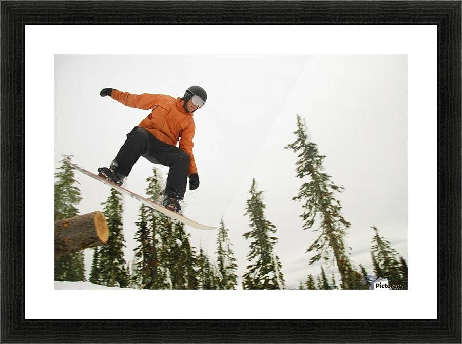 Snowboarder In Mid Air - Powderaddicts