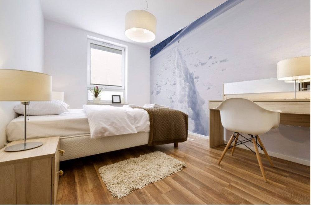 Two distant skiers ski touring across the Ottemma glacier, with skinning tracks - Powderaddicts