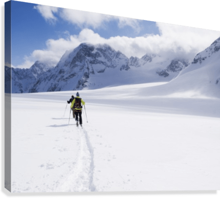 Two skiers ski touring across the Ottemma glacier - Powderaddicts
