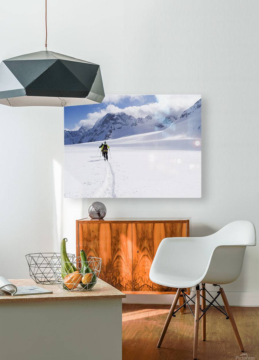 Two skiers ski touring across the Ottemma glacier - Powderaddicts