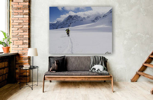 Two skiers ski touring across the Ottemma glacier - Powderaddicts