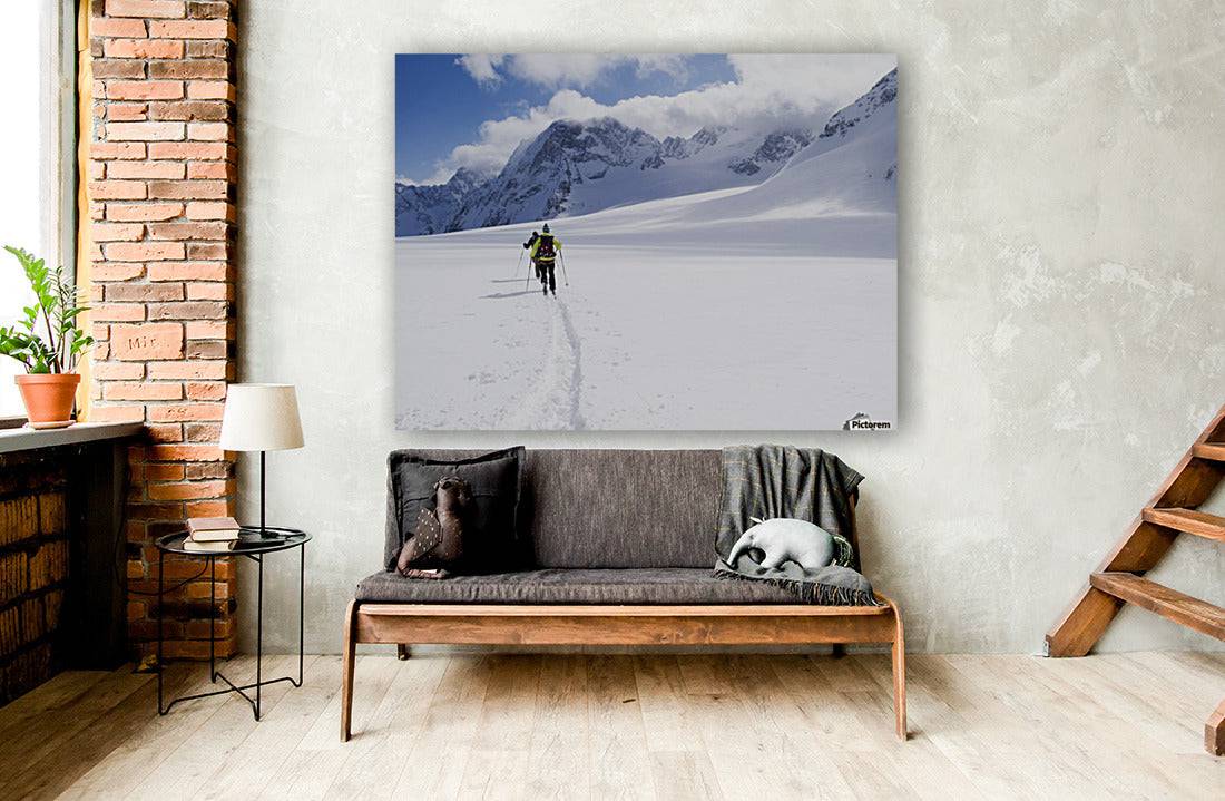 Two skiers ski touring across the Ottemma glacier - Powderaddicts