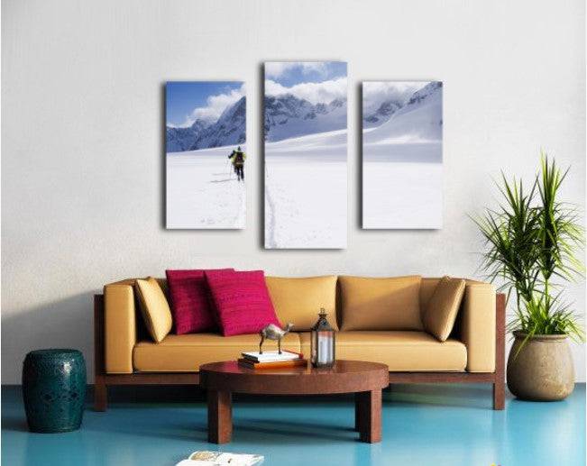 Two skiers ski touring across the Ottemma glacier - Powderaddicts