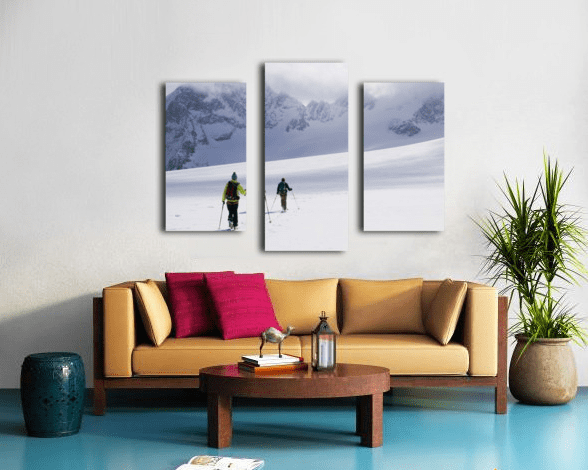 Two skiers ski touring across the Ottemma glacier - Powderaddicts