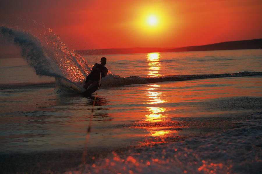Waterskiing At Sunset - Powderaddicts
